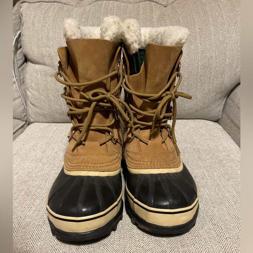 Sorel Wool Caribou™ winter boots
Women’s size 7 Men’s size 9 Medium Brown